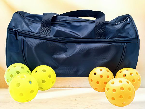 Pickleball carrying case with six colorful pickleballs.