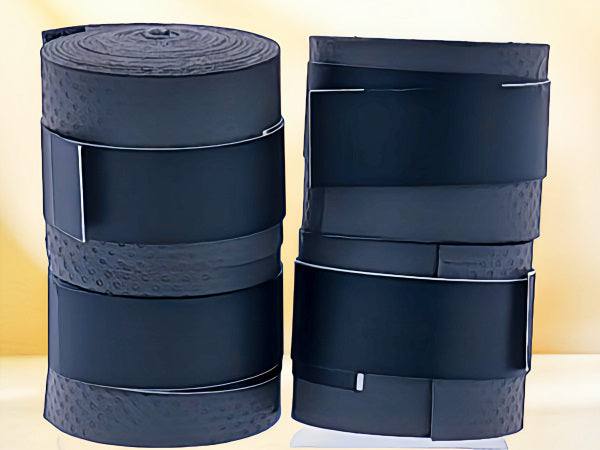 Pickleball grip tape rolls, black, non-slip surface for paddles.
