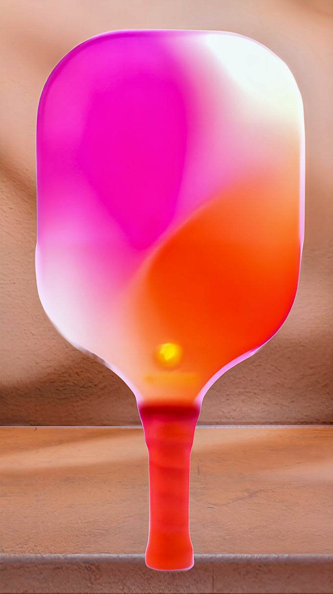USAPA approved fiberglass pickleball paddle with vibrant colors.
