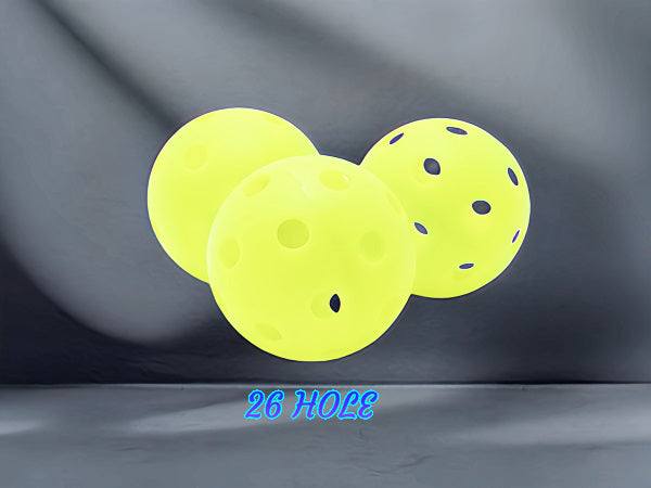 Vibrant yellow pickleball balls with 26 holes for indoor play.