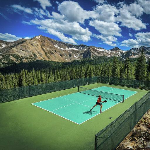 pickleball playbook court in a mountainous high-altitude setting.