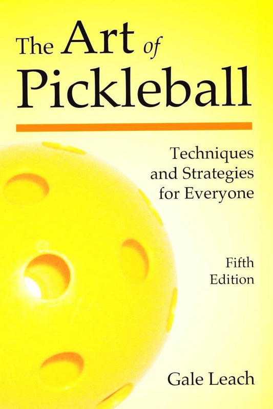 The Art of Pickleball book cover featuring a yellow pickleball.